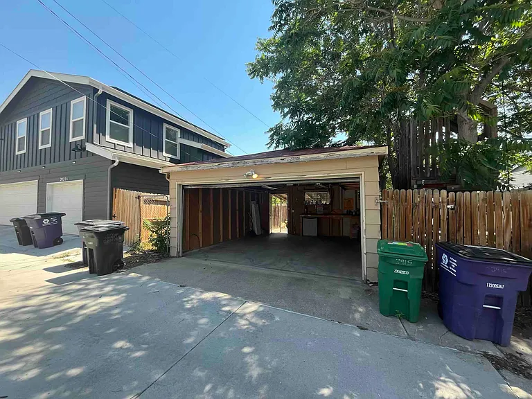Trash and recycling covered by landlord; oversize garage on alley