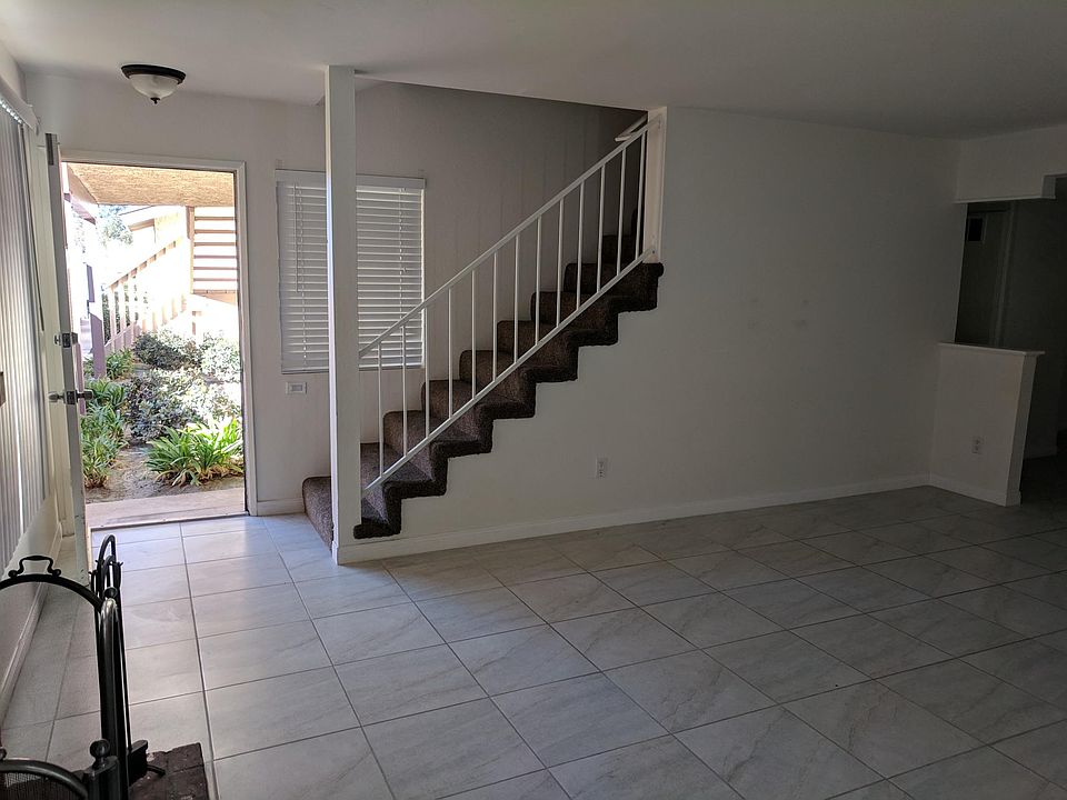 Living room, front door, staircase