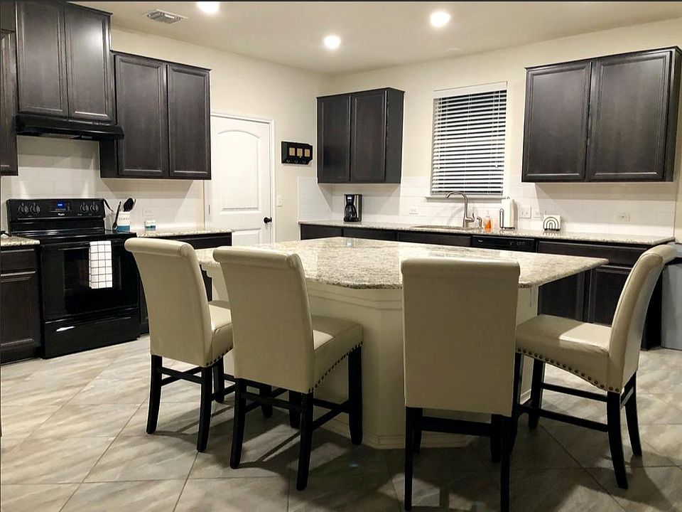 Open, Spacious Kitchen with Sit In Island