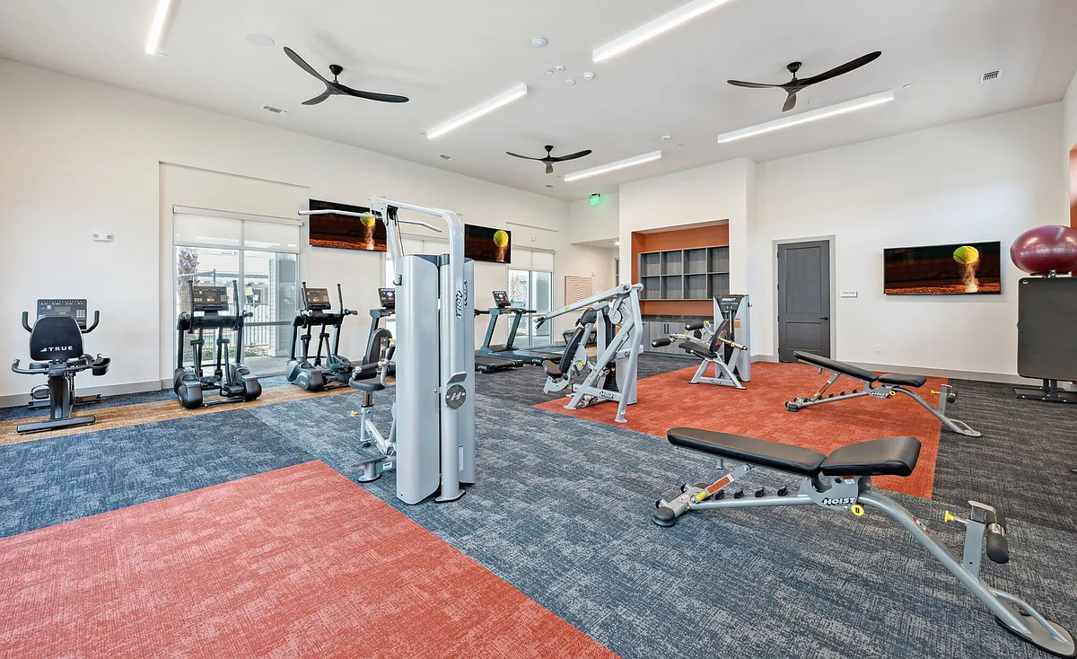 Cardio Equipment and Bench Press at Legacy at Veramendi - Legacy at Veramendi