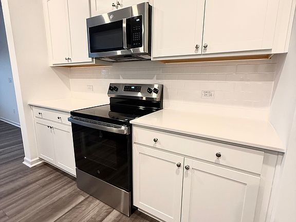 Brand new appliances, stove and cabinets.