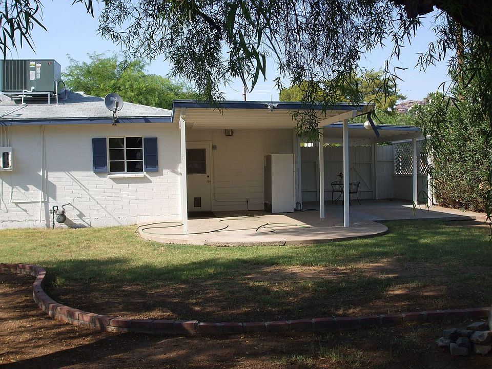 Large Grassy Backyard with 2 Covered Patios