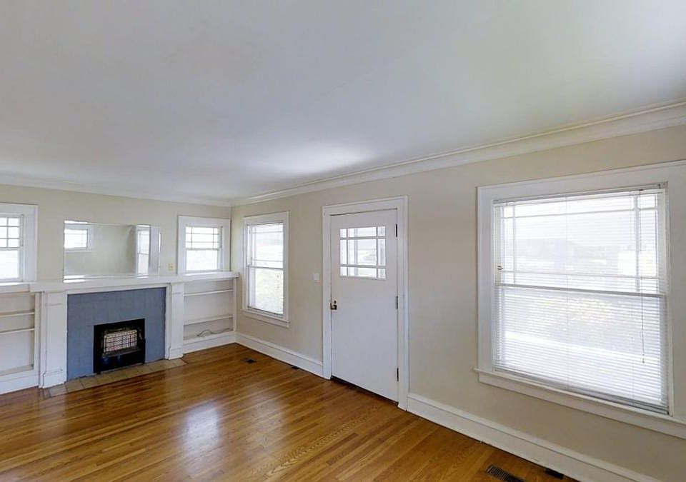 Living room with decorative fireplace