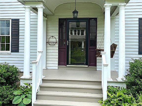 Front door with porch swing