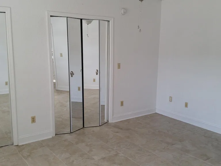DOWNSTAIRS LARGE BEDROOM/CLOSETS/BATH