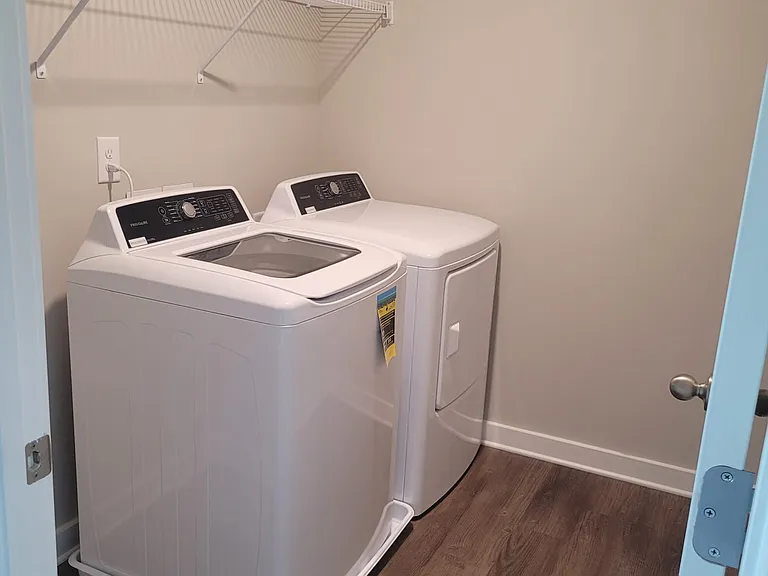 laundry room with washer and dryer in unit