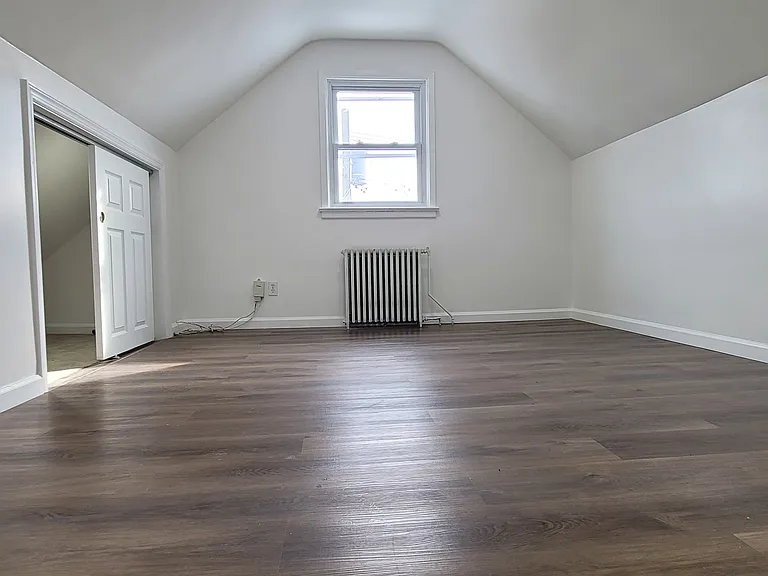 Bedroom #3 with cathedral ceilings and walk in closet