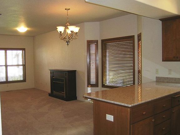 Living room, dining area, electric fireplace