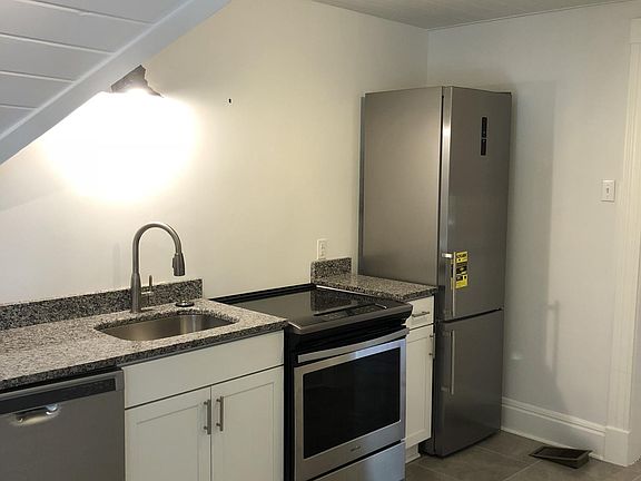 kitchen with granite counters & stainless appliances