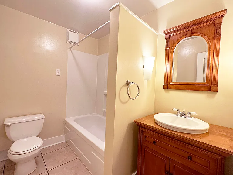 Cherry Bath Vanity, Full Sized Tub with Shower