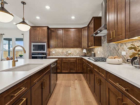 Abundant cabinet space in kitchen model representation