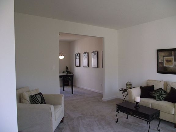 Formal living room or add some french doors to convert to office space!