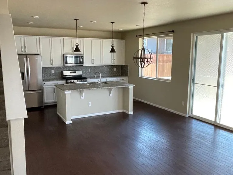 Open concept kitchen and dining space
