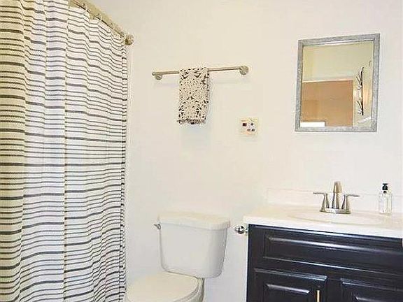 Bathroom with tub and shower