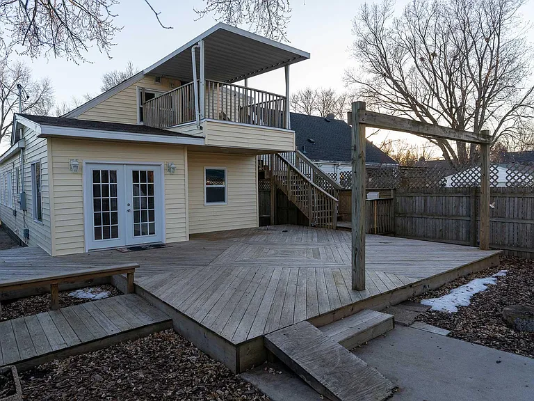 The backyard deck is huge and comes equipped with a gas line to connect a gas appliance.