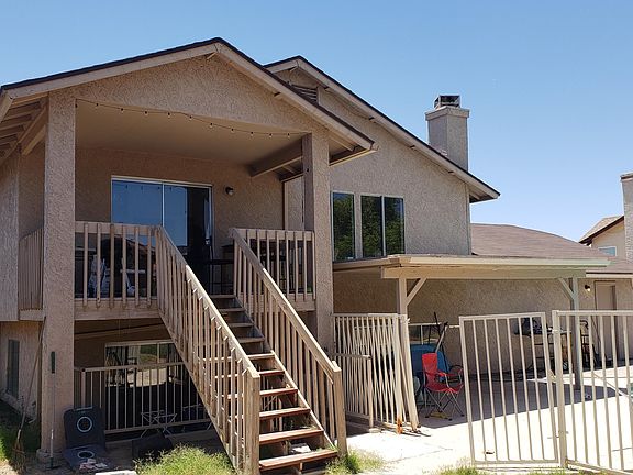 3rd image of 7744 W SURREY Avenue