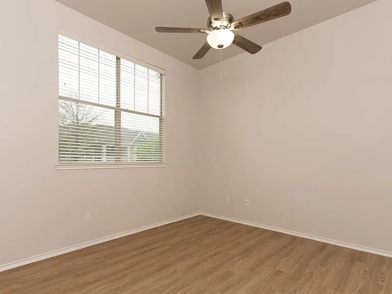 Bedroom with hard surface flooring
