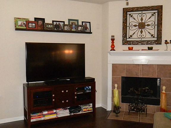 No TV is too large for family room and you have a nice corner gas fireplace to make the room really 