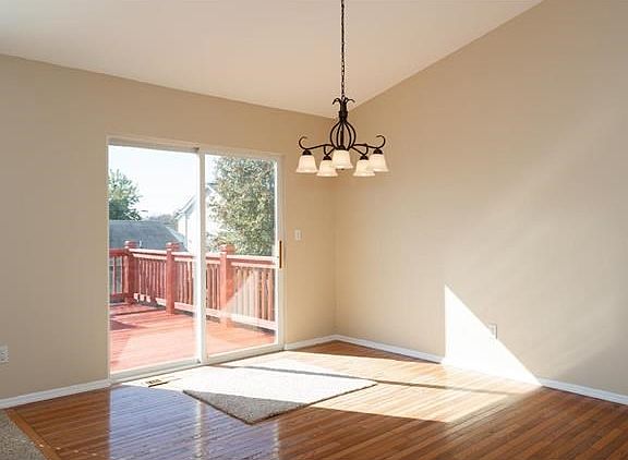 Breakfast room with updated hardwood flooring