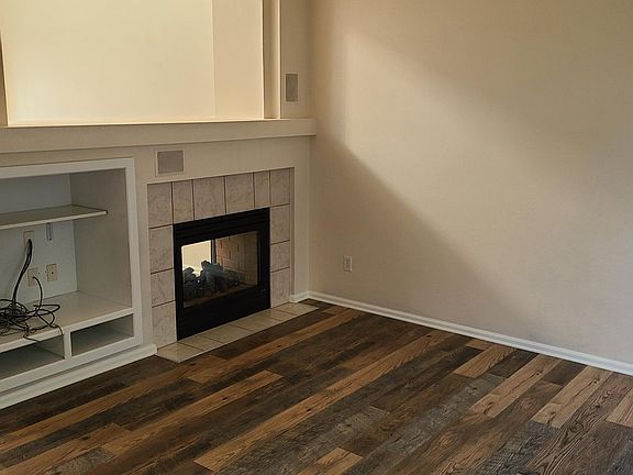 family room, shared fireplace between family room and main room