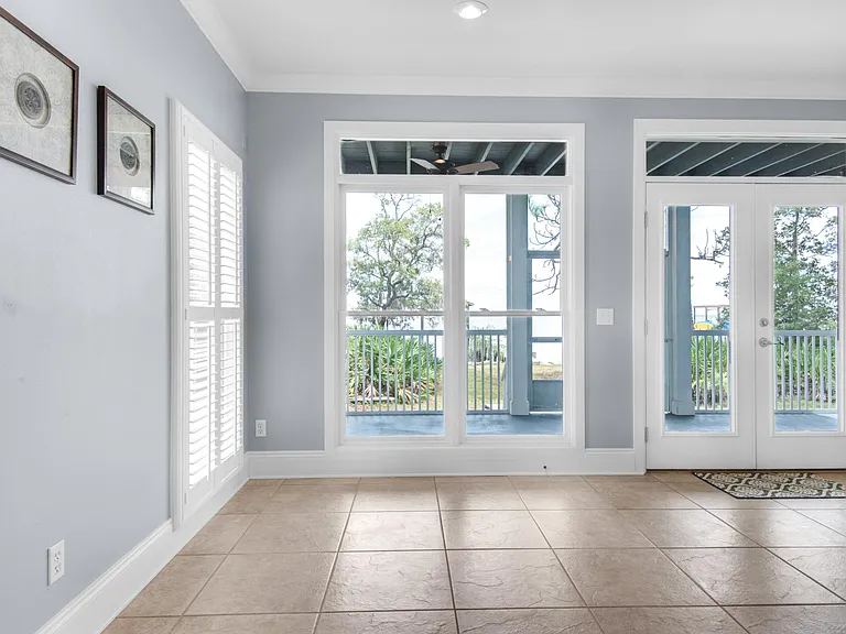 Floor to ceiling window wall downstairs and upstairs