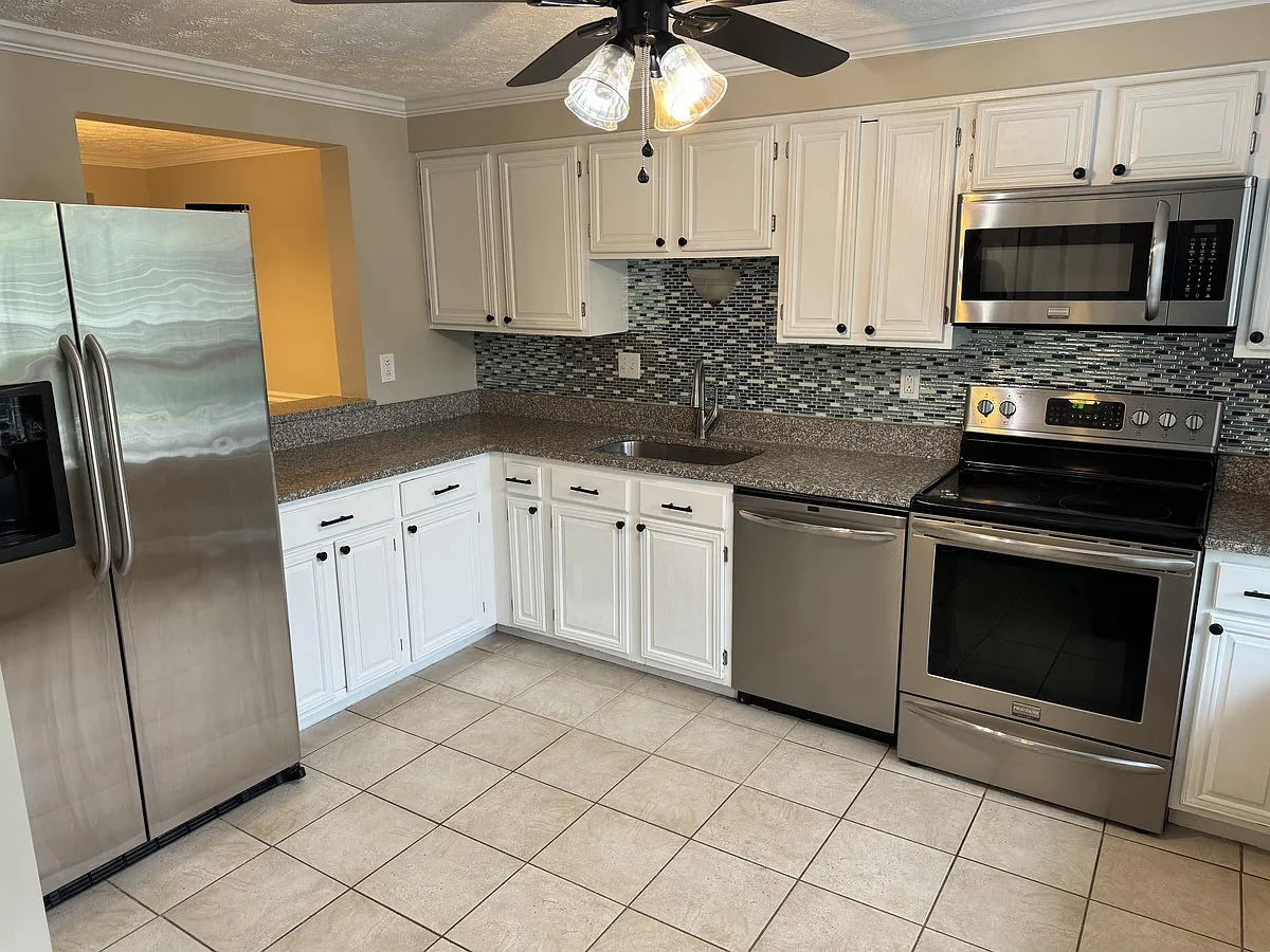 Kitchen with stainless steel appliances - 19048 Partridge Wood Dr #1