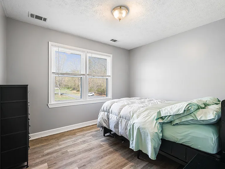 Bedroom 3 Full size bed. Room darkening curtains were added after photo.