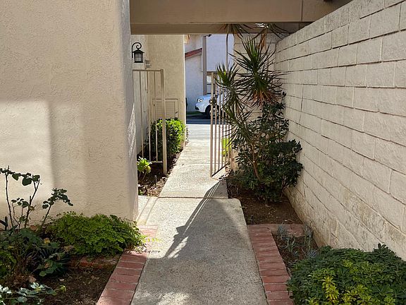 Walkway to front of home