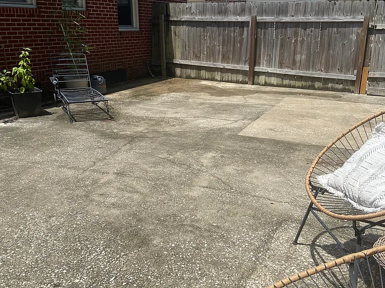 Large backyard concrete patio