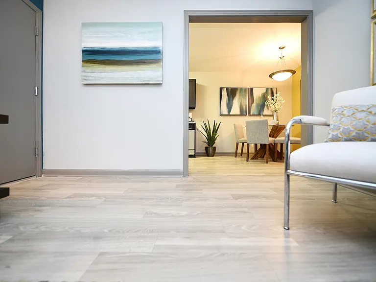 Spacious living room with hardwood-style flooring