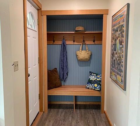 Entry way mud room perfect to store shoes, bags and sit down to take shoes on and off.