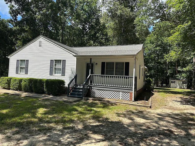 Front of house with covered front porch