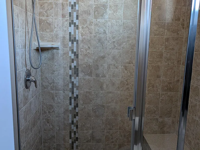 Primary Bathroom - Tiled Shower with bench