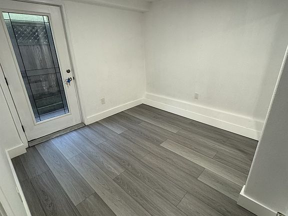 Bedroom with door to private patio