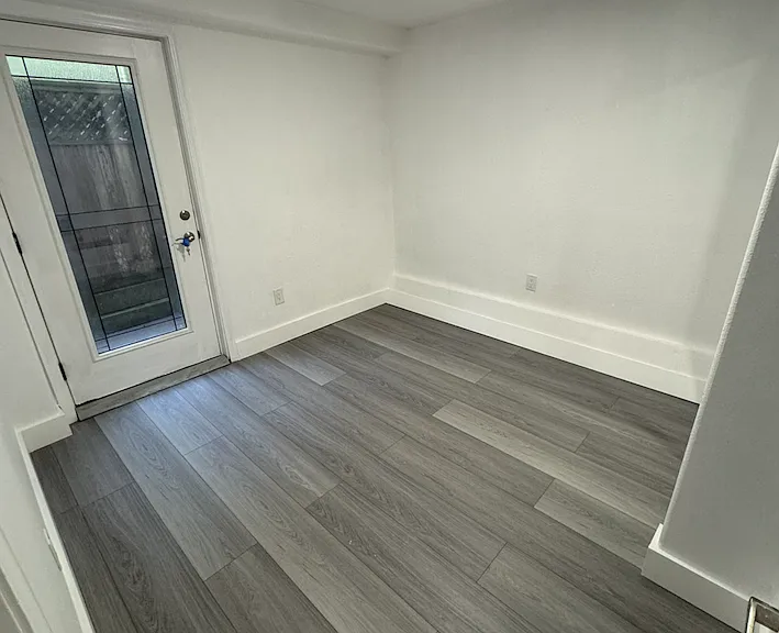 Bedroom with door to private patio