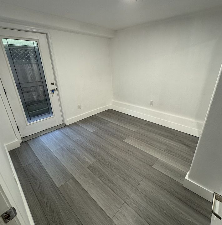 Bedroom with door to private patio