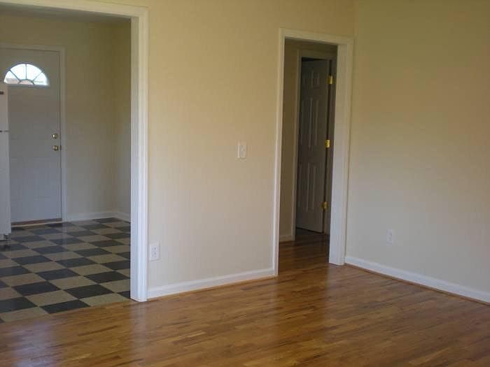 living room opens into kitchen