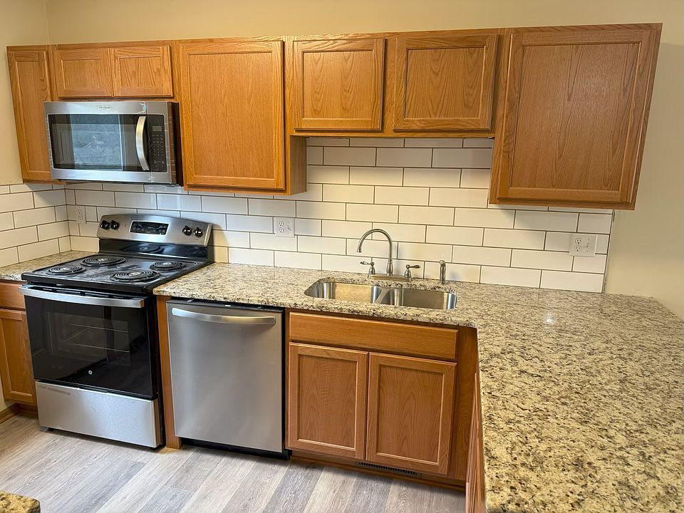 Kitchen with Granite Countertops & Back Splash