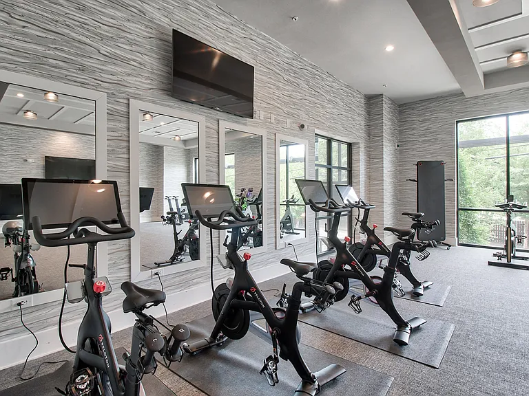 Spin bikes in fitness center with on-demand fitness classes