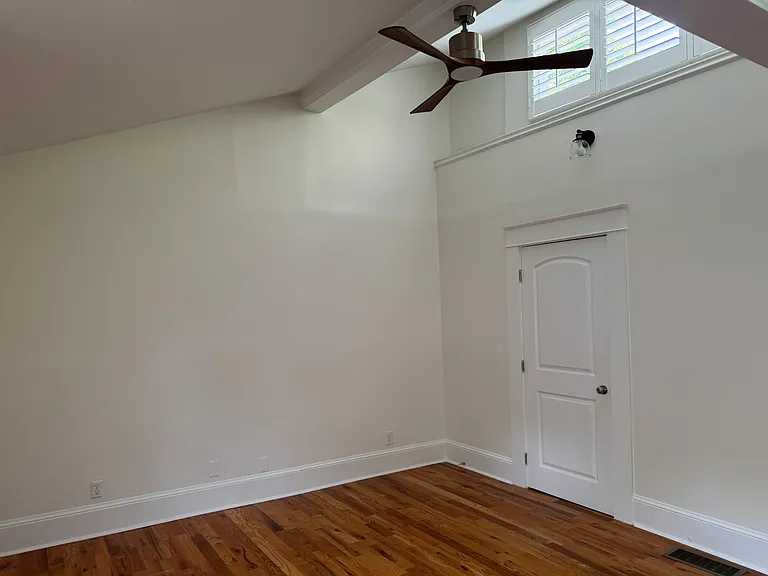 Primary bedroom, bathroom door.