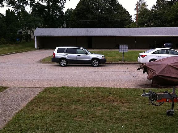 A maximum of 2 cars are allowed on a daily basis, with room for one car under the free carport (carport has small private garage storage space)