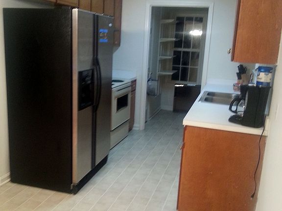 Kitchen with SS refrigerator