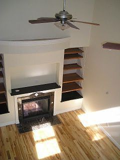 Upper Level Loft with Curved Balcony overlooking Family Room