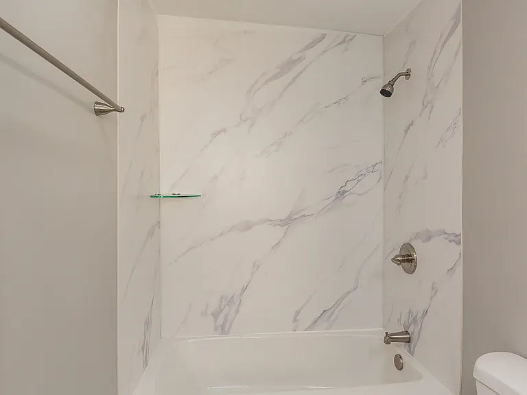 Second floor full bathroom tub/Shower, Some photos are mirror opposite from 201 W High St both finished the same inside.