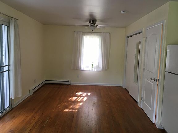 Living room area with large closet