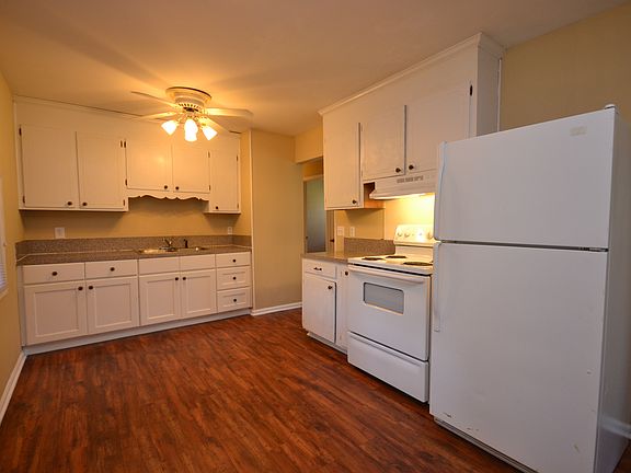 Spacious kitchen includes stove and refrig