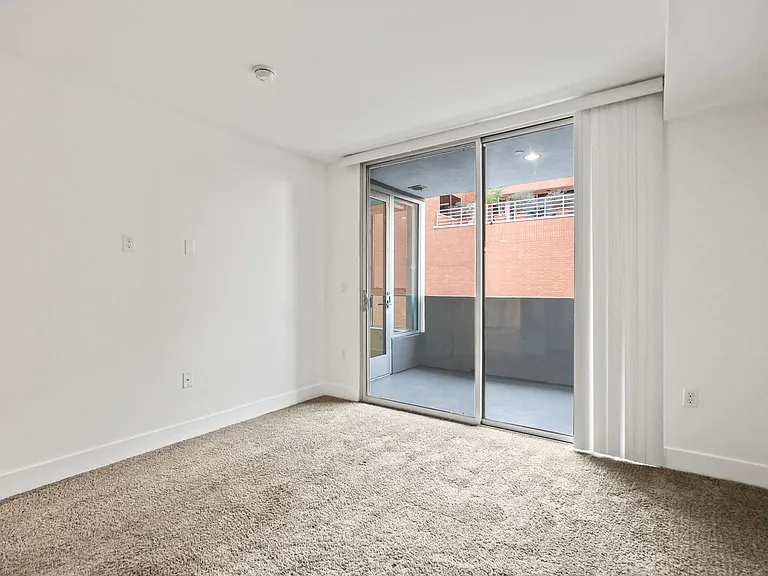 Bedroom With Patio Access