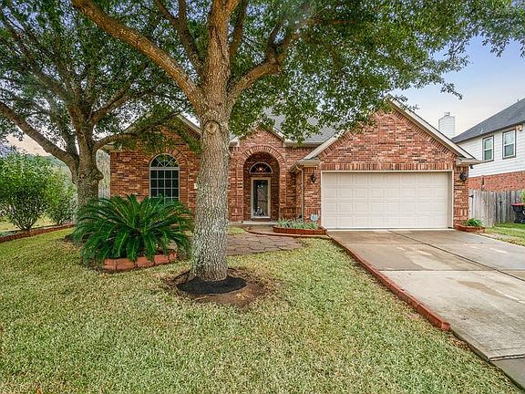 Two beautiful oaks provide wonderful shade and value to your home!