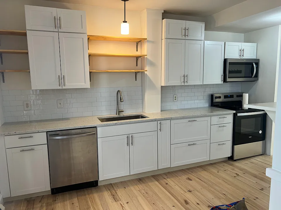 Kitchen - new stainless appliances, cabinets, and granite countertop. Dishwasher included.