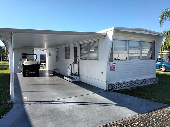 Front of the home and carport